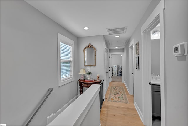 209 Pinckney St, Greenville, SC 29601 - hall with light wood-style floors and recessed lighting