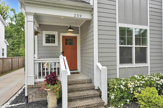 209 Pinckney St, Greenville, SC 29601 - doorway to property featuring board and batten siding