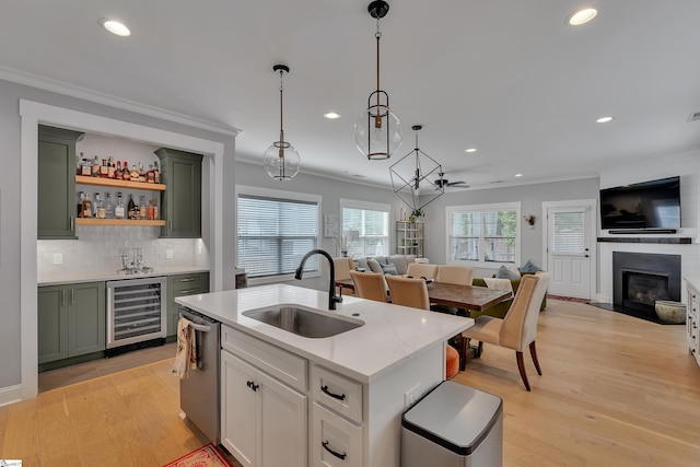209 Pinckney St, Greenville, SC 29601 - kitchen with wine cooler, open floor plan, dishwasher, recessed lighting, and green cabinetry