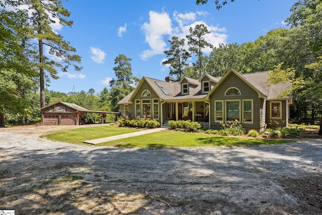 229 Armstrong Rd, Honea Path, SC 29654 - view of front of property featuring a front lawn, a porch, a chimney, a garage, and an outdoor structure