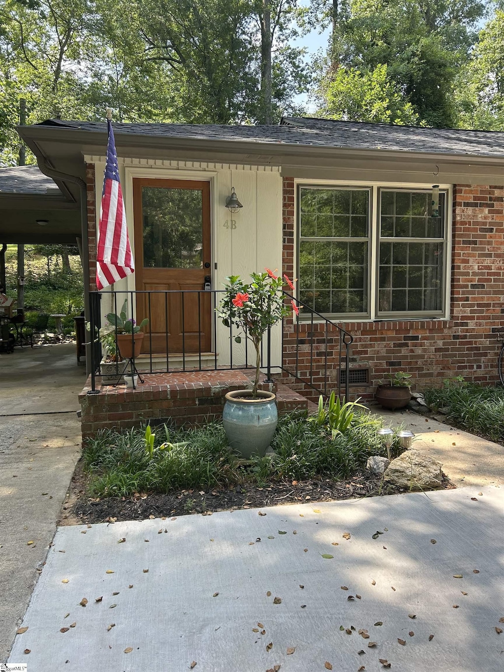 4B Heritage Ct, Greenville, SC 29615 - property entrance with brick siding and concrete driveway