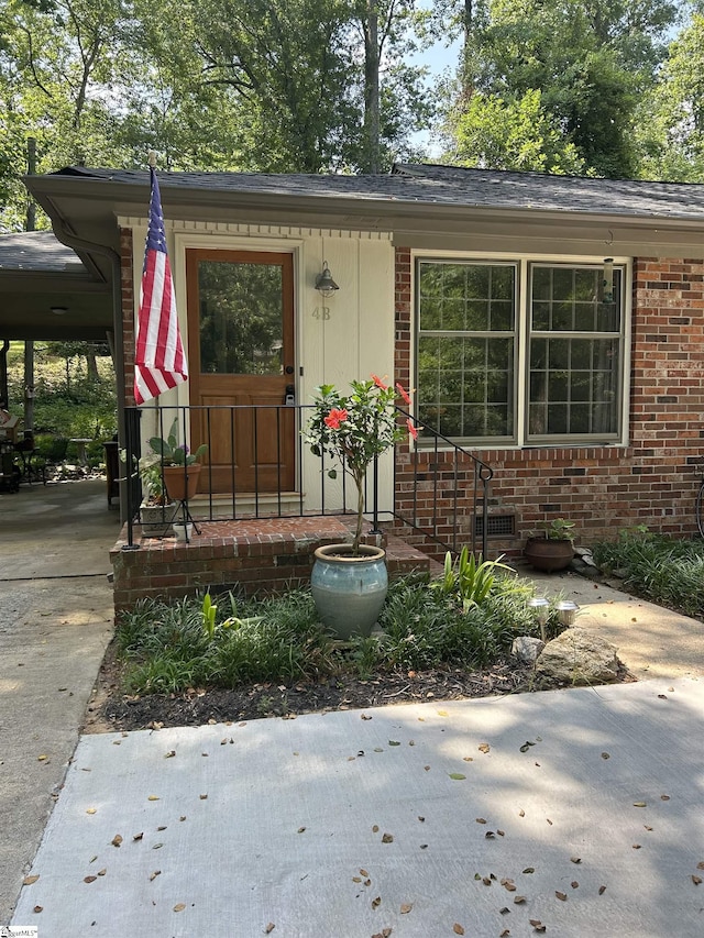 4B Heritage Ct, Greenville, SC 29615 - property entrance with brick siding and concrete driveway