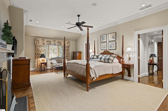 540 Crescent Ave, Greenville, SC 29601 - bedroom featuring dark wood-style floors, ornamental molding, recessed lighting, a fireplace, and a ceiling fan