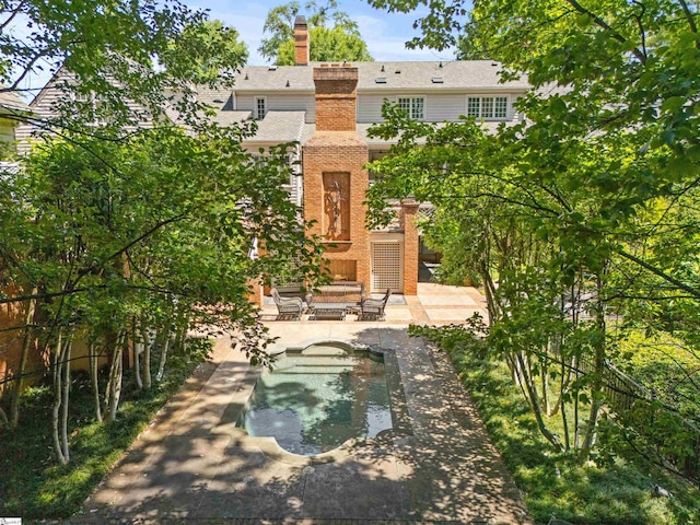 540 Crescent Ave, Greenville, SC 29601 - back of property featuring a patio area and brick siding