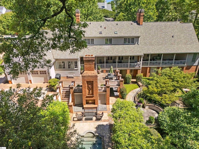 540 Crescent Ave, Greenville, SC 29601 - back of house with a patio area, a chimney, roof with shingles, and stairs
