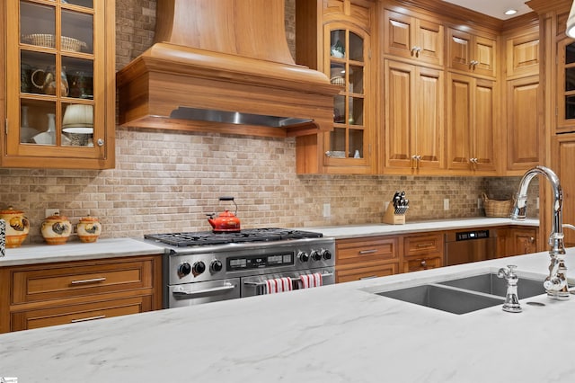 540 Crescent Ave, Greenville, SC 29601 - kitchen featuring high end stove, custom range hood, and brown cabinets