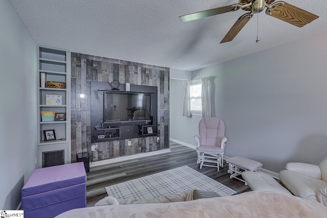 103 Birchwood St, Easley, SC 29642 - living room with wood finished floors, ceiling fan, and a textured ceiling