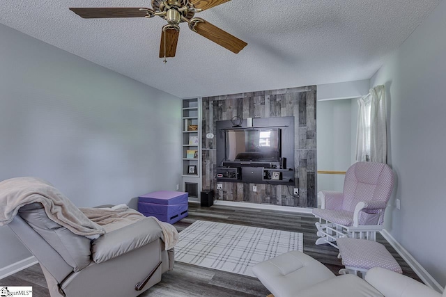 103 Birchwood St, Easley, SC 29642 - living room featuring a textured ceiling, ceiling fan, and wood finished floors