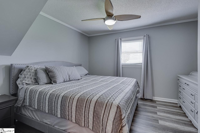 103 Birchwood St, Easley, SC 29642 - bedroom featuring wood finished floors, a textured ceiling, ceiling fan, and ornamental molding
