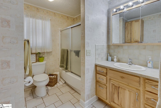 103 Birchwood St, Easley, SC 29642 - full bathroom with wallpapered walls, ornamental molding, vanity, a textured ceiling, and combined bath / shower with glass door