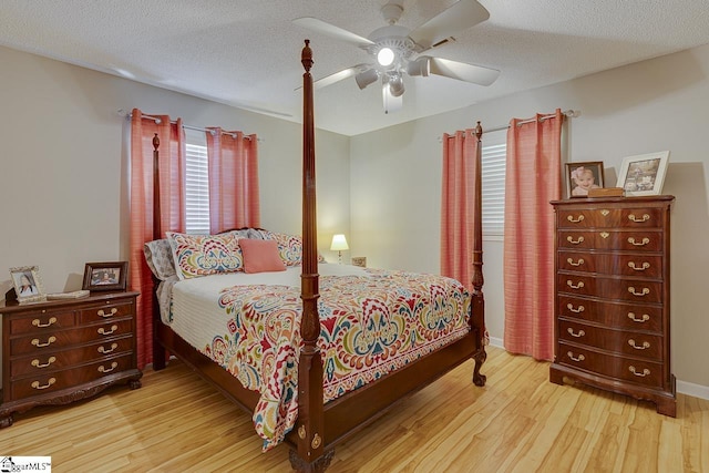 103 Birchwood St, Easley, SC 29642 - bedroom featuring wood finished floors, a ceiling fan, and a textured ceiling