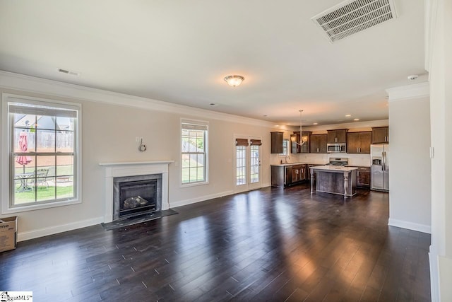 203 Redmont Ct, Simpsonville, SC 29680 - living area featuring ornamental molding, a premium fireplace, dark wood-type flooring, and recessed lighting