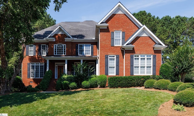 805 Carriage Hill Rd, Simpsonville, SC 29681 - view of front facade with brick siding and a front lawn