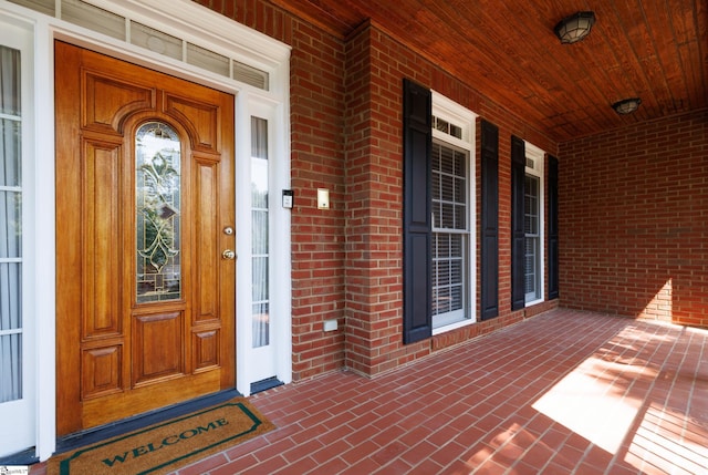 805 Carriage Hill Rd, Simpsonville, SC 29681 - property entrance featuring a porch and brick siding