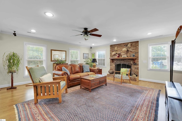 1 Redcliffe Rd, Greenville, SC 29615 - living area featuring light wood finished floors, crown molding, healthy amount of natural light, ceiling fan, and recessed lighting