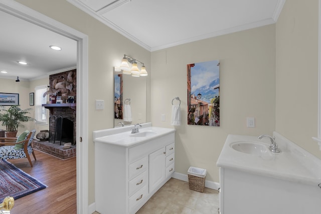 1 Redcliffe Rd, Greenville, SC 29615 - bathroom featuring vanity, a brick fireplace, ornamental molding, and recessed lighting