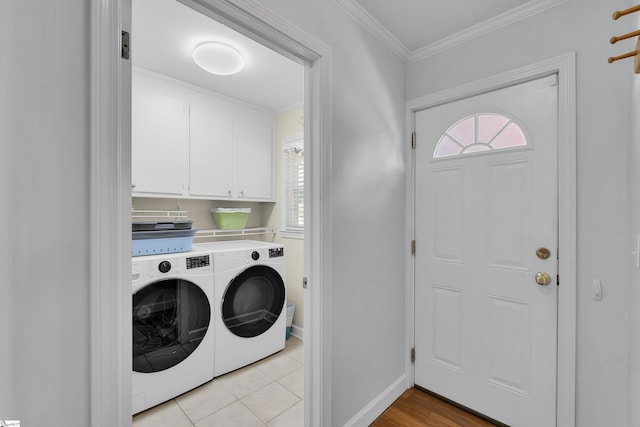 1 Redcliffe Rd, Greenville, SC 29615 - laundry room featuring cabinet space, washer and dryer, crown molding, and light tile patterned floors