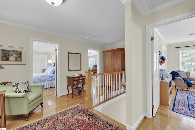 1 Redcliffe Rd, Greenville, SC 29615 - hallway featuring an upstairs landing, crown molding, light wood-type flooring, and attic access