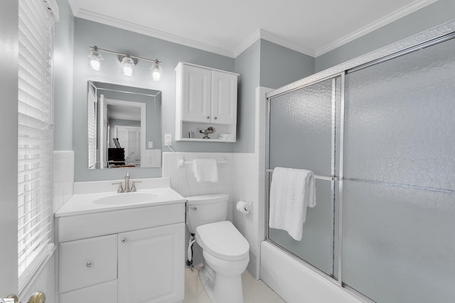 1 Redcliffe Rd, Greenville, SC 29615 - bathroom with vanity, bath / shower combo with glass door, crown molding, tile walls, and a wainscoted wall