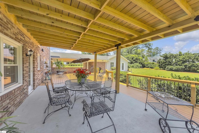 1 Redcliffe Rd, Greenville, SC 29615 - view of patio with outdoor dining area, an outbuilding, and a wooden deck