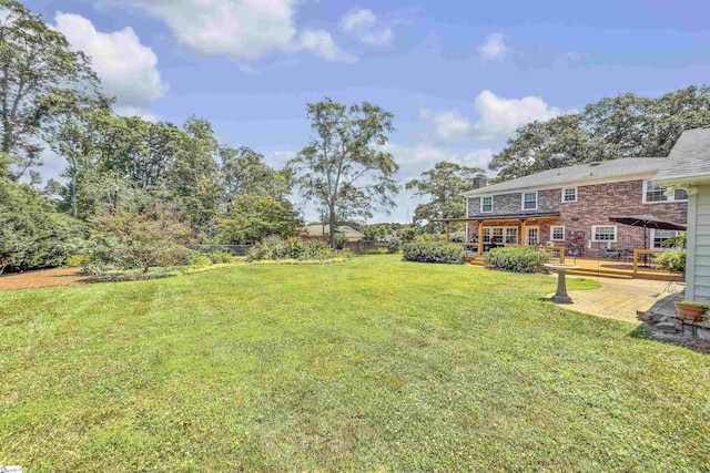 1 Redcliffe Rd, Greenville, SC 29615 - view of green lawn featuring a deck