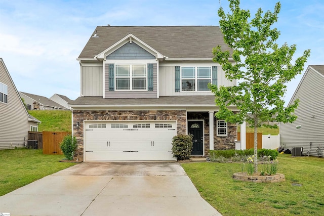 144 Caledonia Dr, Easley, SC 29642 - craftsman house with board and batten siding, a garage, stone siding, and driveway