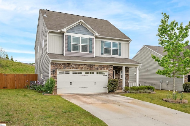 144 Caledonia Dr, Easley, SC 29642 - craftsman house with board and batten siding, an attached garage, driveway, stone siding, and covered porch