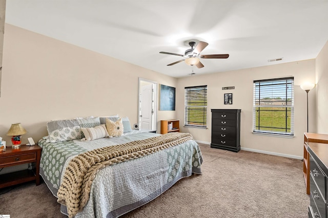 144 Caledonia Dr, Easley, SC 29642 - carpeted bedroom featuring baseboards and ceiling fan