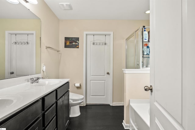 144 Caledonia Dr, Easley, SC 29642 - full bath with double vanity, wood finished floors, a shower, and a bath
