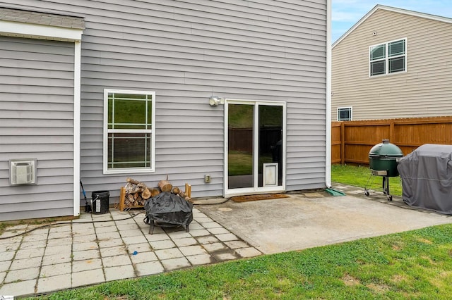 144 Caledonia Dr, Easley, SC 29642 - rear view of property featuring a fire pit and a patio
