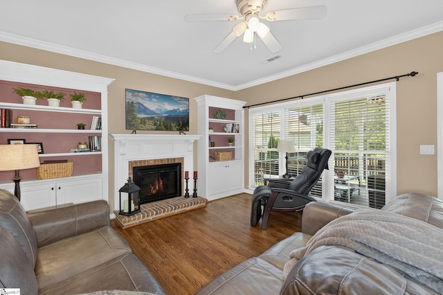 3 Promontory Ct, Greenville, SC 29615 - living room with wood finished floors, crown molding, ceiling fan, and a fireplace