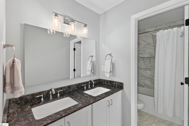 3 Promontory Ct, Greenville, SC 29615 - bathroom with marble look tile flooring, double vanity, and shower / tub combo