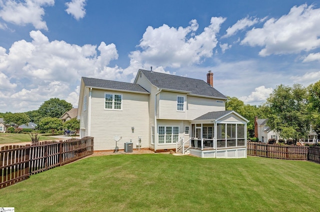 3 Promontory Ct, Greenville, SC 29615 - rear view of property with a sunroom, a fenced backyard, and a chimney