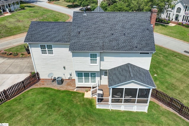 3 Promontory Ct, Greenville, SC 29615 - rear view of property featuring a shingled roof, a sunroom, a chimney, and a fenced backyard