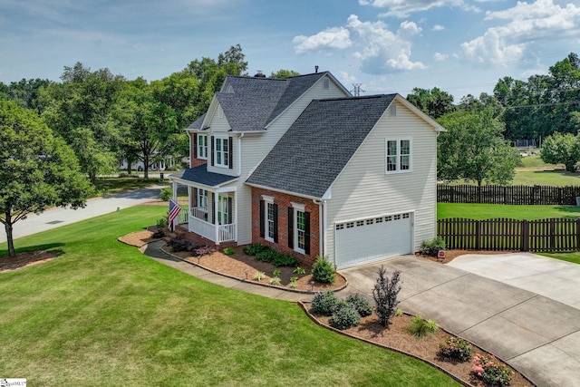 3 Promontory Ct, Greenville, SC 29615 - view of front of house with an attached garage, concrete driveway, brick siding, covered porch, and a shingled roof