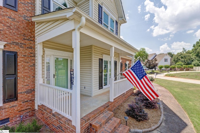 3 Promontory Ct, Greenville, SC 29615 - view of exterior entry with covered porch and brick siding