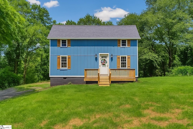 17 Allen St, Enoree, SC 29335 - view of front of house featuring a front lawn and a deck