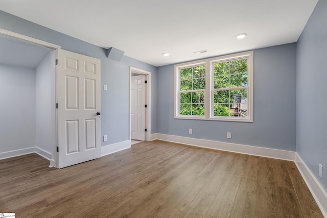 17 Allen St, Enoree, SC 29335 - unfurnished bedroom with wood finished floors and recessed lighting