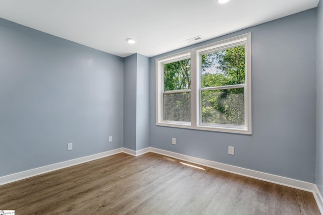 17 Allen St, Enoree, SC 29335 - empty room with wood finished floors and recessed lighting