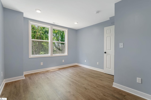17 Allen St, Enoree, SC 29335 - spare room featuring wood finished floors and a smoke detector