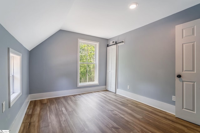 17 Allen St, Enoree, SC 29335 - additional living space featuring lofted ceiling, wood finished floors, and a barn door