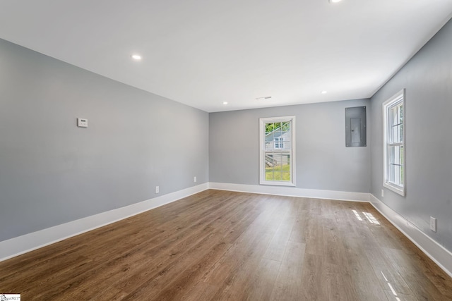 17 Allen St, Enoree, SC 29335 - spare room with plenty of natural light, wood finished floors, electric panel, and recessed lighting