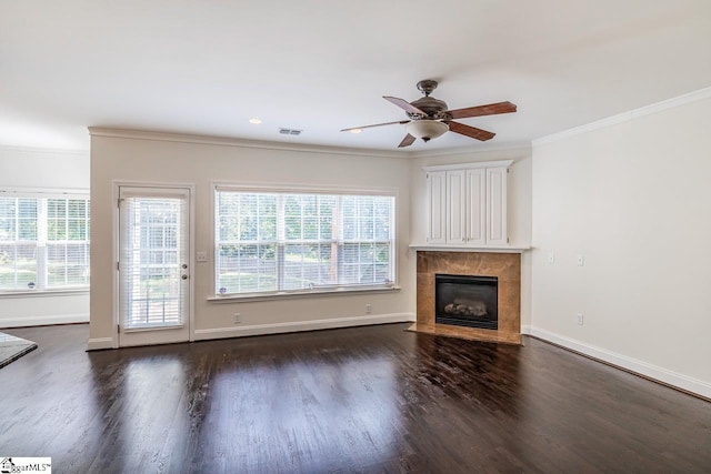 607 Greening Dr, Simpsonville, SC 29681 - unfurnished living room with ornamental molding, wood finished floors, a premium fireplace, plenty of natural light, and a ceiling fan