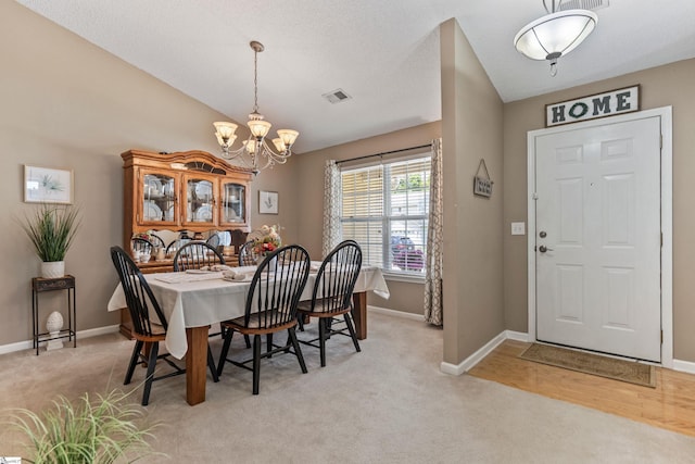 243 Rivers Edge Dr, Easley, SC 29642 - dining area with a chandelier and light carpet