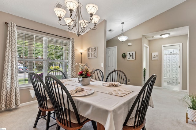 243 Rivers Edge Dr, Easley, SC 29642 - dining area with light carpet, a chandelier, and vaulted ceiling