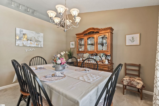243 Rivers Edge Dr, Easley, SC 29642 - dining space with light colored carpet and a chandelier