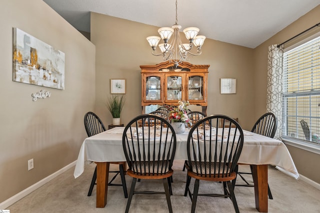 243 Rivers Edge Dr, Easley, SC 29642 - dining room featuring a chandelier, light carpet, lofted ceiling, and plenty of natural light