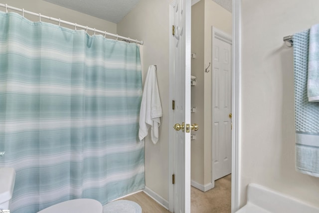 243 Rivers Edge Dr, Easley, SC 29642 - bathroom featuring toilet and baseboards