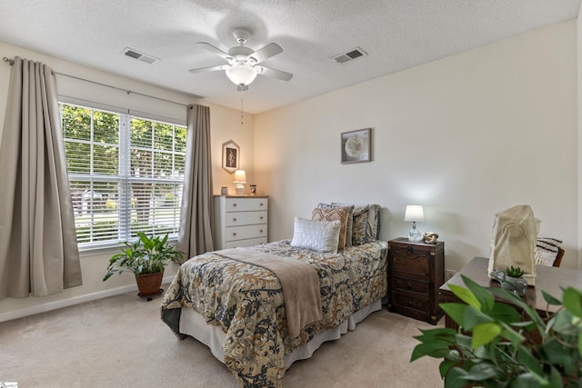 243 Rivers Edge Dr, Easley, SC 29642 - bedroom featuring light carpet, a textured ceiling, and a ceiling fan