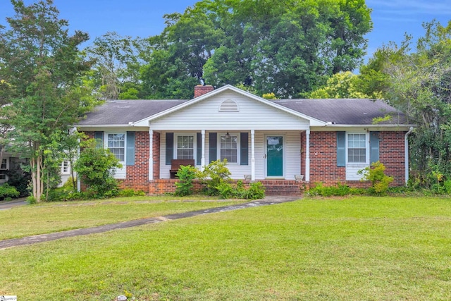 15 Jones Ave, Greenville, SC 29601 - ranch-style house featuring brick siding, a chimney, a front lawn, and a porch